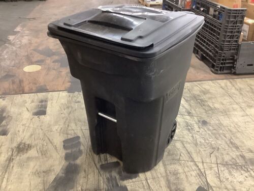 Toter 96 Gallon Black Rolling Outdoor Garbage/Trash Can with Wheels and Attached Lid - Lid Slightly Bent  - Lot 163