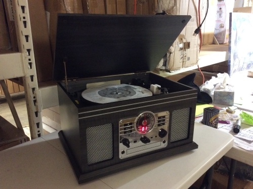 6-in-1 Nostalgic Entertainment Center With Bluetooth Connectivity. Used/Returned. Tested/ Works. Cosmetic Damage. - Lot 147