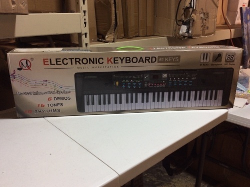 61-Key Electronic Keyboard Music Workstation. Appears New - Lot 481