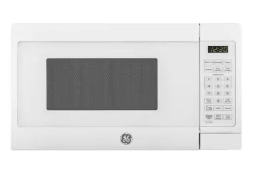 GE 0.7 cu. ft. Small Countertop Microwave in White  - Lot 77
