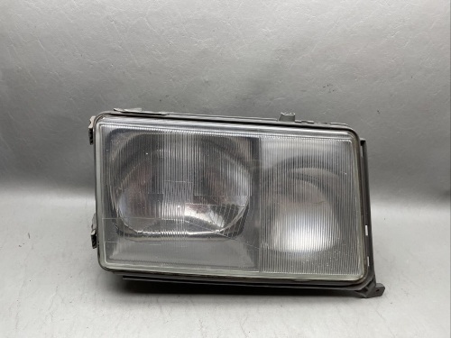 W124 early generation headlight Mercedes-Benz NOS OEM Drivers side headlight only - Lot 104