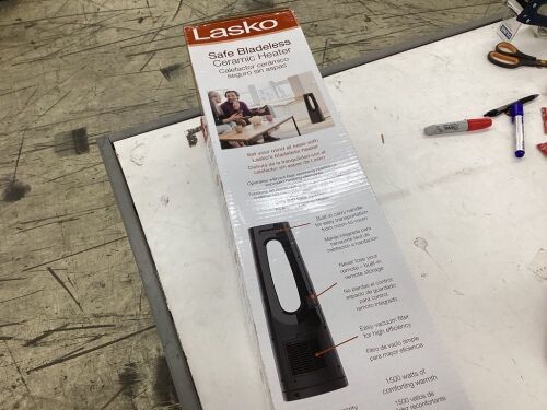 Lasko Bladeless 1500W 28 in. Black Electric Oscillating Tower Ceramic Space Heater with Remote Control and Digital Display  - Lot 401