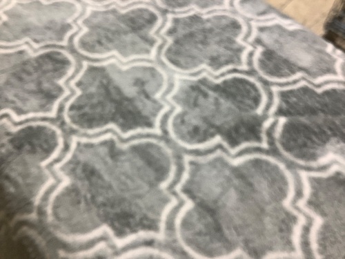 gray and white area rug 10ftx7ft - Lot 221