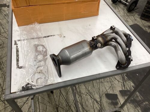 Catalytic Converter with Integrated Exhaust Manifold  - Lot 618