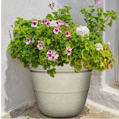 12.5 In. Clover River Stone Resin Planter lot of 7 @ $14.56 =$101.92 Indoor/outdoor resin construction is lightweight and durable UV coated finish protects colors from fading Weather and crack resistant - Lot 715