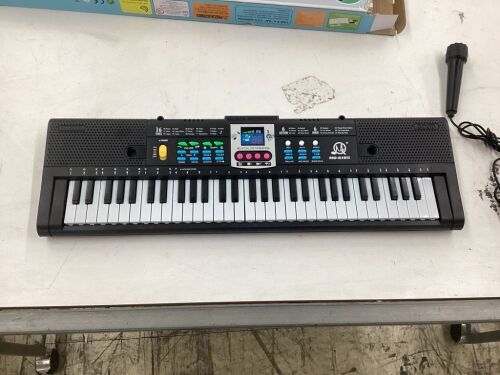 Electronic Teaching Keyboard  - Lot 738