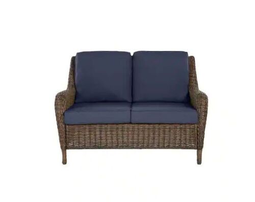 Hampton Bay Cambridge Brown Wicker Outdoor Patio Loveseat with CushionGuard Midnight Navy Blue Cushions - Lot 47