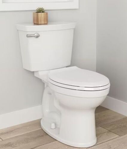 American Standard Champion Two-Piece 1.28 GPF Single Flush Elongated Chair Height Toilet with Slow-Close Seat in White - Lot 92