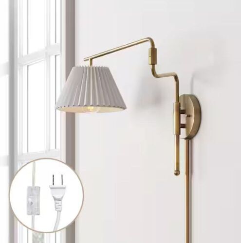 Nathan James Kai 30 in. W 1-Light Vintaged Brass Modern Wall Mounted Plugin Bedside Reading Lamp Wall Sconce with Pleated Shade - Lot 540