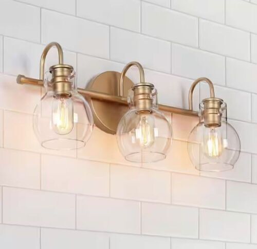 LNC Robb Modern 3-Light Gold Bathroom Vanity Light Interior Powder Room Lighting with Clear Globe Shades - Lot 559
