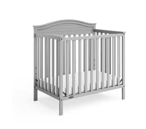 Graco Stella Pebble Gray 4-in-1 Convertible Mini Crib  - Lot 106