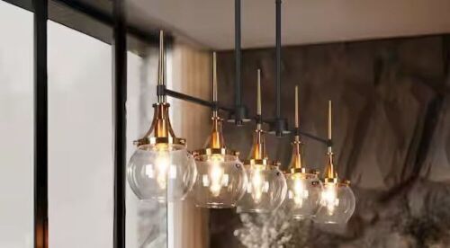 LNC 36.2 in. Transitional 5-Light Black and Brass Linear Chandelier with Clear Globe Glass Shades  - Lot 397