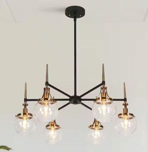 LNC Modern 6-Light Black and Brass Island Chandelier  - Lot 496
