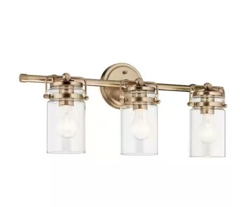 KICHLER Brinley 24 in. 3-Light Champagne Bronze Vintage Bathroom Vanity Light with Clear Glass - Lot 786