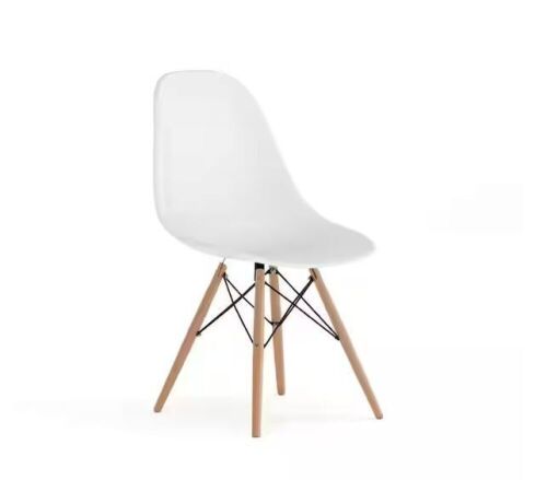 Carnegy Avenue Elon Series White Plastic Side Chair with Wooden Legs - Lot 153