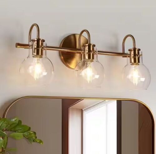 LNC Modern Brass 3-Light Vanity Light 22 in. with Globe Clear Glass Shades - Lot 487