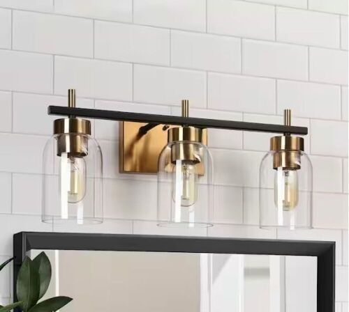 Zevni 20 in. Modern 3-Light Brass Gold Bathroom Vanity Light, Black Bath Lighting with Cylinder Clear Glass Shades - Lot 583