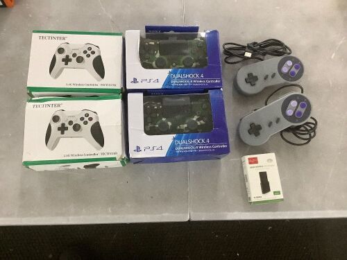 Lot of (6) Video Game Controllers & (1) Xbox Matrix SSD Adapter - Lot 676