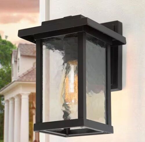 LNC 1-Light Black Modern Farmhouse Outdoor Wall Lantern Sconce with Water Glass Shade - Lot 252