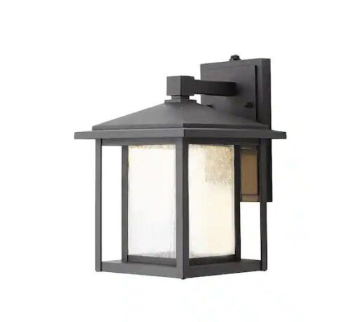 Home Decorators Collection Mauvo Canyon 11 in. Black Dusk to Dawn Small LED Outdoor Wall Light Fixture Sconce with Seeded Glass - Lot 453