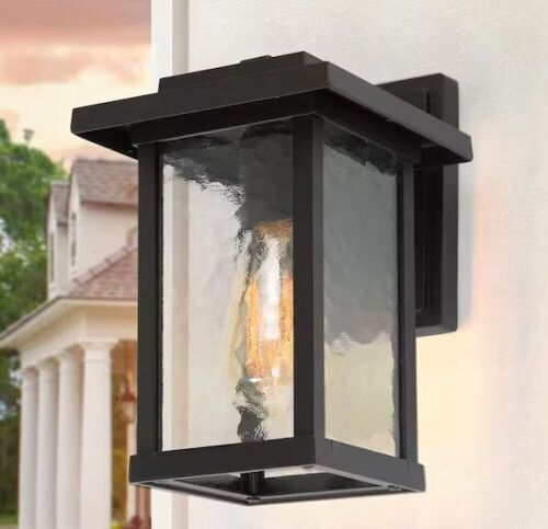 LNC 1-Light Black Modern Farmhouse Outdoor Wall Lantern Sconce with Water Glass Shade - Lot 852