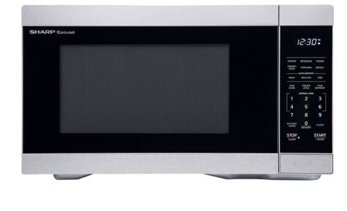 Sharp 1.1 cu. ft. Mid-Size Countertop Microwave Oven - Lot 53