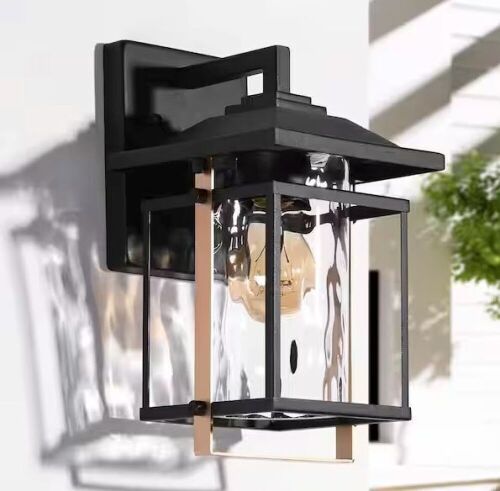 Uolfin Black and Brass Outdoor Hardwired Wall Lantern Sconce with Water-Rippled Glass Shade - Lot 526