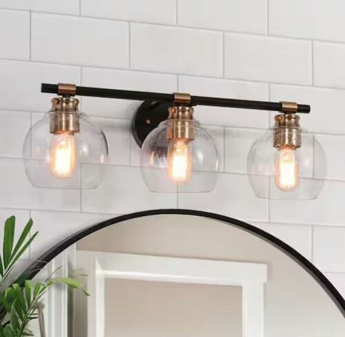 Zevni 22 in. 3-Light Modern Brass Globe Seeded Glass Rustic Black Vanity Light - Lot 639