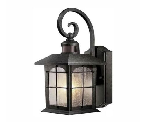 Home Decorators Collection Brimfield Motion-Sensing 14.2 in. Aged Iron 1-Light Line Voltage Outdoor Wall Light Sconce - Lot 562