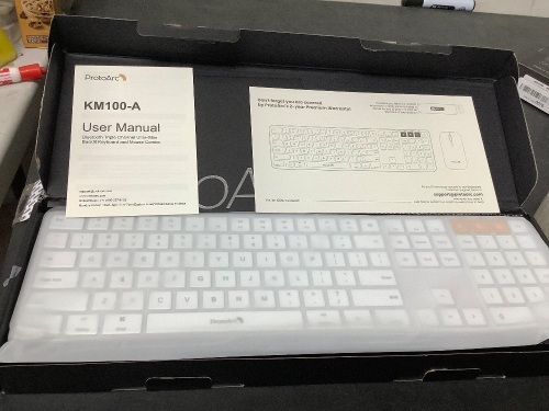 ProtoArc KM100- A Bluetooth Triple Channel Ultra-Slim Backlit Keyboard and Mouse Combo - Lot 1158
