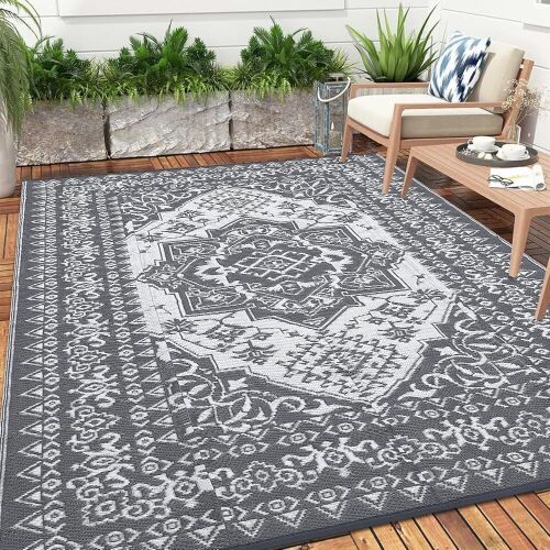 Outdoor Reversible Plastic Straw Rug 5' x 8'  - Lot 351