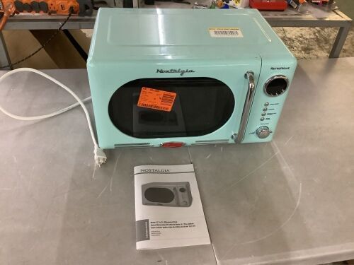 Nostalgia Retro 0.7 cu. ft. 700-Watt Countertop Microwave Oven in Aqua - Lot 465JF