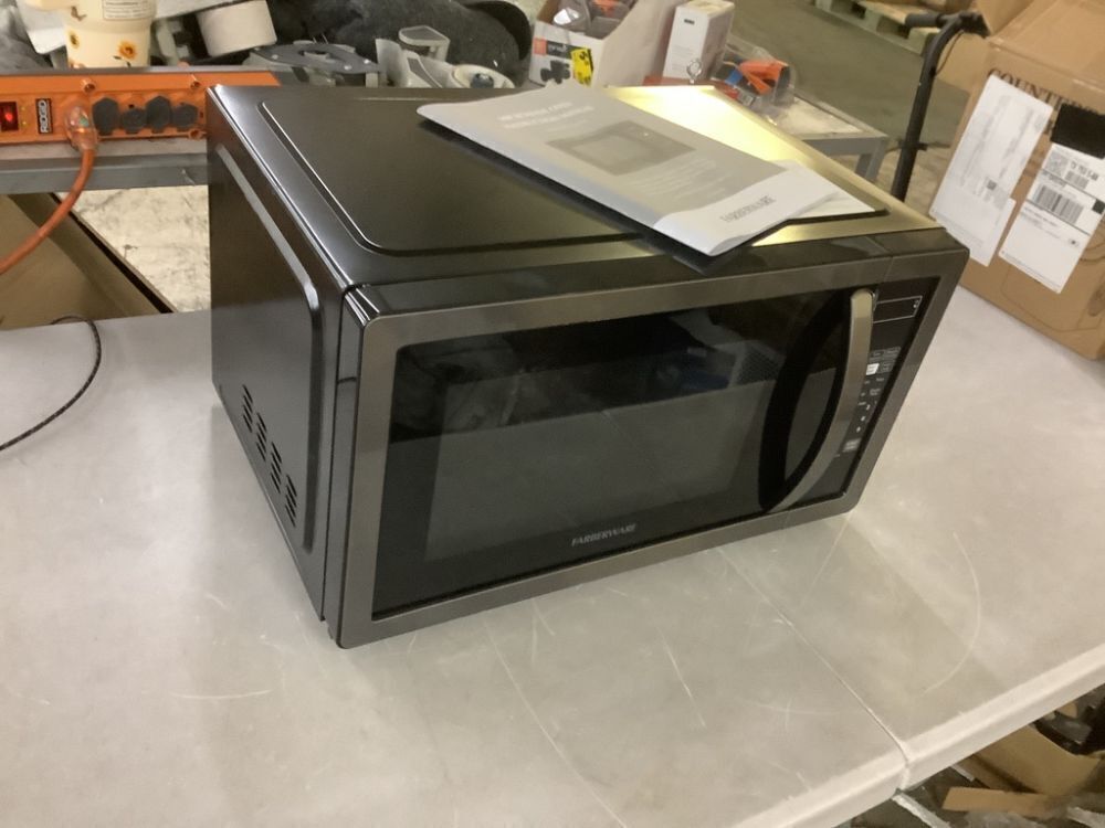 Farberware Classic 1.1 cu. ft. 1000-Watt Countertop Microwave Oven, Black Stainless Steel - Image 1 - Lot 760JF