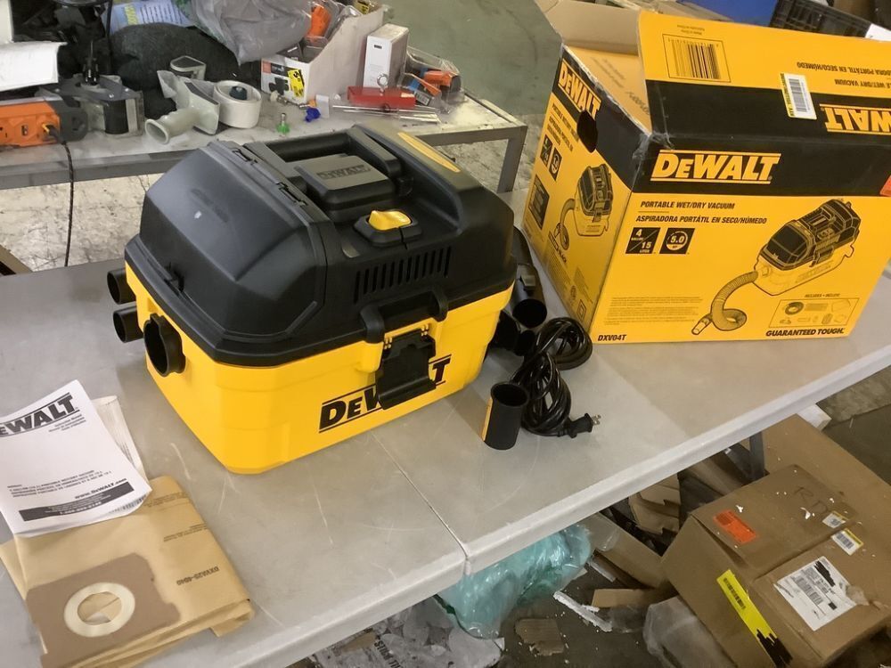 DEWALT 4 Gal. 5.0 HP Poly Wet/Dry Vacuum with Hose and Accessories - Image 2 - Lot 31JF