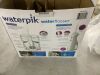 Waterpik Ultra Plus and Cordless Enhance 3000 Water Flosser Combo Pack - Thumbnail 5