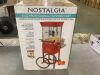 Nostalgia Vintage Professional 8 Oz Kettle Red Popcorn Machine Cart with Interior Light, Measuring Spoons and Scoop - Thumbnail 2