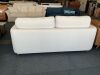 Cream sofa under storage - Thumbnail 3