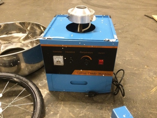 Portable Cotton Candy Maker. Powers Up. Bowl has a dent. Unknown if the cart is complete - Lot 268