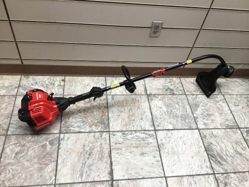 CRAFTSMAN WC210 25-cc 2-Cycle 17-in Curved Shaft Gas String Trimmer. E-Commerce Return. Condition Unknown.  - Lot 475