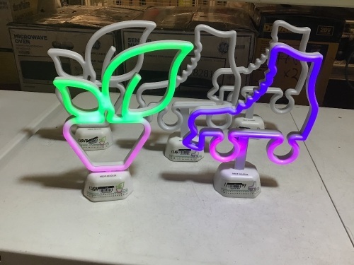 Lot of (5) Multicoloed Shaped Neon Lights. (3) Roller Skate Neons Lights & (2) Strawberry Shaped Neon Lights. Tested/Works. Appears New.  - Lot 901