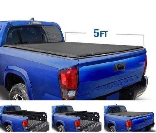 Tyger Auto T1 Soft Roll Up Tonneau Cover. Fits 2016-18 Toyota Tacoma Fleetside 5' Bed. Appears New.  - Lot 937