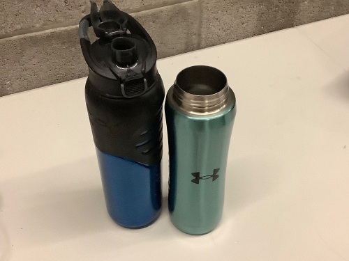 Lot of (2) Under Armor water bottles. Blue - 24 oz., Teal 14 oz. Missing or broken parts - Lot 122