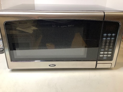 Oster 1.1 Cu. Ft. Microwave Oven, 1000 Watts - Lot 9