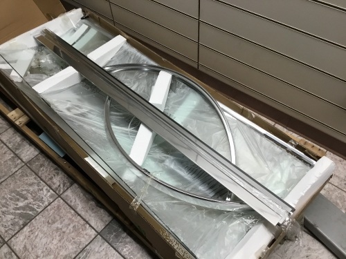 American Standard Axis 72-in H x 23-in to 45.3125-in W Framed Curved Chrome Shower Door (Clear Glass). Unknown Condition. Store Return - Lot 481
